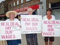 Staff claim victory in wage protest