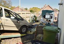 Couple escape as ­runaway car crashes into parked caravan