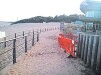 Beach access blocked by sand