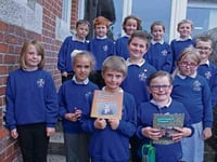 Windmill Hill Academy pupils Leon Harvey and Jack Mullen become young authors thanks to book making project