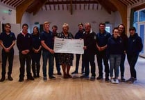 Cheque presented to construction charity
