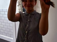Millie braves hair chop to raise funds!