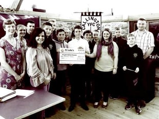 YFC presents cheque for St Luke's Hospice
