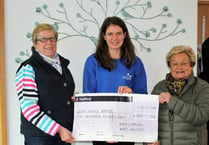 Money raised on whist holiday donated to The Long House