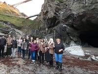 English Heritage team swap castle for sand during beach clean