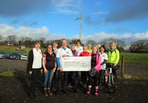 Cyclists unite to make donation to newly formed charity
