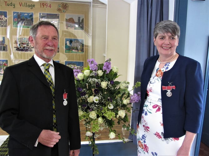 Les Eastlake and Karen Roberts received the British Empire Medal (BEM) for their dedicated service to the community shop 