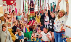 Drag queen delights audience during library story hour