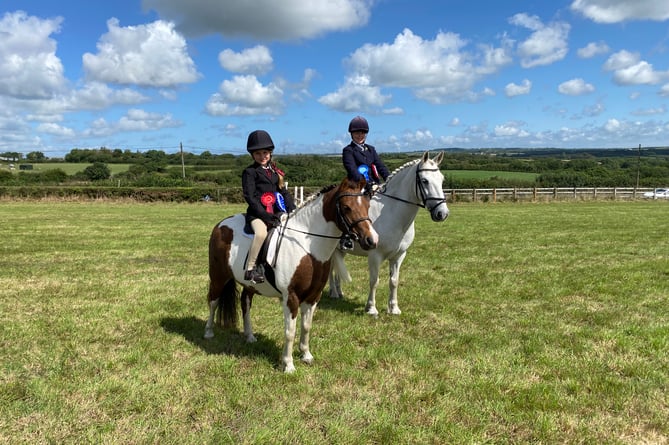 There was competition between cousins, Jane Hasson (left), aged six, and Chloe McLaren (right), aged 12, of Bude, in the horse ring. Chloe and her horse Blizzard came away with the Local Champion award, just pipping Jane and Biscuit, the Reserve Champions, to the win