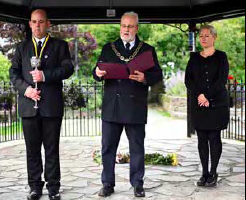 Camelford Town Mayor Rob Rotchell reads out the Proclamation of King Charles III outside Enfield Park along with Stephen Bond (Deputy Mayor) and Esther Greig (Camelford Town Council Town Clerk)