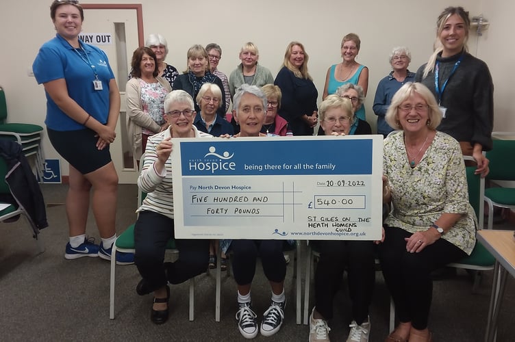 A cheque for £540 was presented to Jadeen and Erin from North Devon Hospice