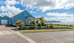 Live beside the sea in this beachfront house for sale 