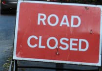 Road closed following wall collapse