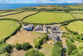 500-year old manor house comes with 200 acres of land and beach access