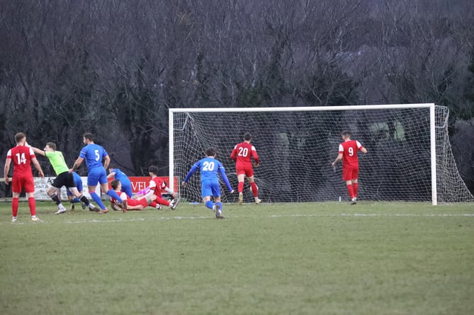 Bude celebrate their 94th minute equaliser against Wadebridge Town on Saturday.