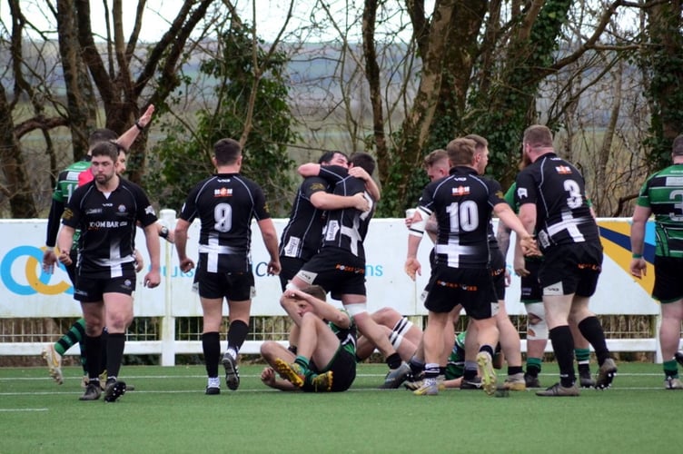 Levent Bulut and George Bone (7) celebrate a Launceston try during their clash at Ivybridge on Saturday in Regional One South West.