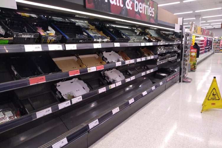 Empty shelves at a Sainsburys supermarket (file photo)