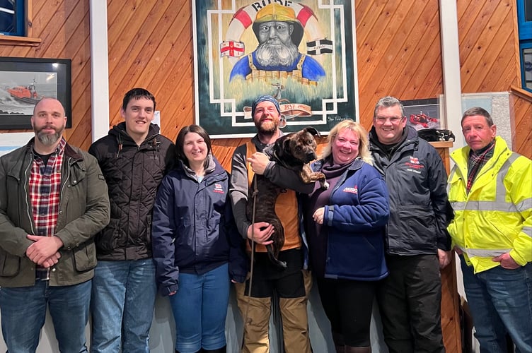 Tim Jones and Monty the dog are pictured meeting the Bude RNLI team
