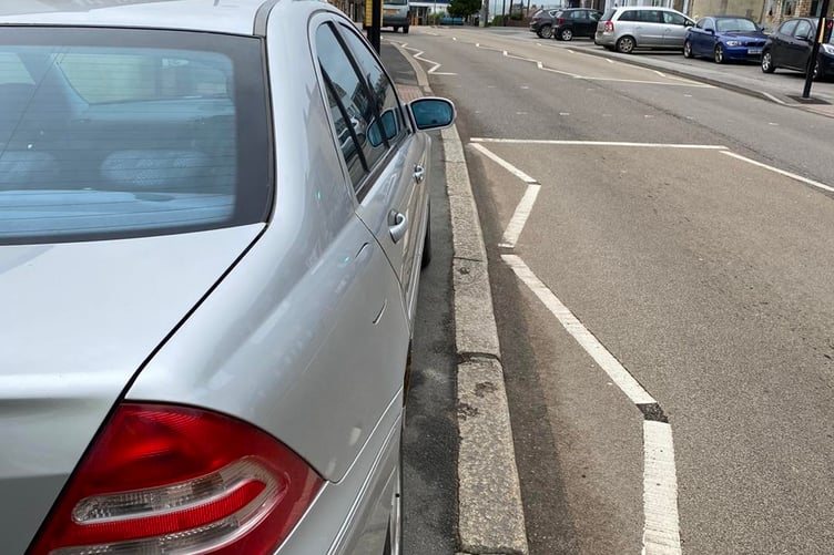 Cars parked on the pavement at Higher Bore Street, Bodmin