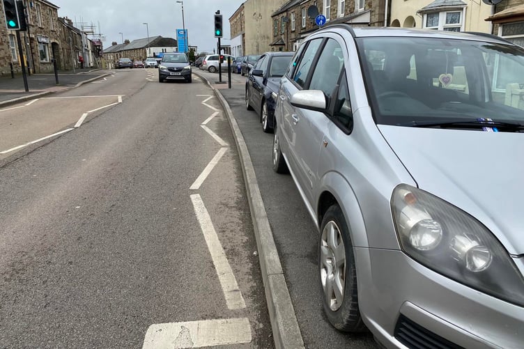 Cars parked on the pavement at Higher Bore Street, Bodmin