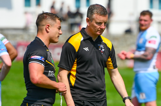 Cornwall head coach Mike Abbott (right) and winger Harry Aaronson (left)