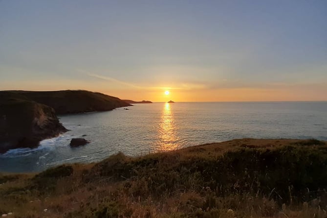 Sunset over Sunday Bay in Cornwall
