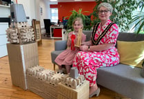 Children show off their skills for architectural model competition
