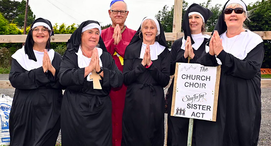 Members of the St Teath Church Choir singing for joy with Sister Act
