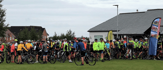 The cyclists line up for the charity ride
