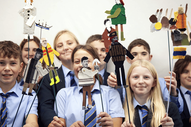 Budehaven students display puppets based on local historical figures involved in the town’s Storm Tower which feature in their film made alongside Storyline