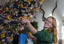 National Trust installs Christmas garland comprising 25,000 flowers
