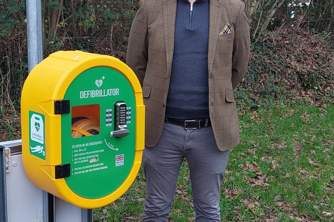 Estates and Properties Manager Martin Cornish with the new defibrillator 