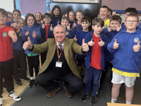 MP keeps promise to visit school