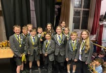School children awarded during cross country presentation evening 