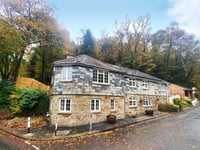 "Iconic" former toll house for sale comes with its own woodlands