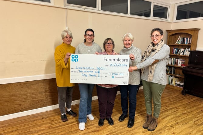 Co-op Funeralcare are great supporters of the local community and members are pictured here presenting a cheque for £250 to the St Thomas Church community