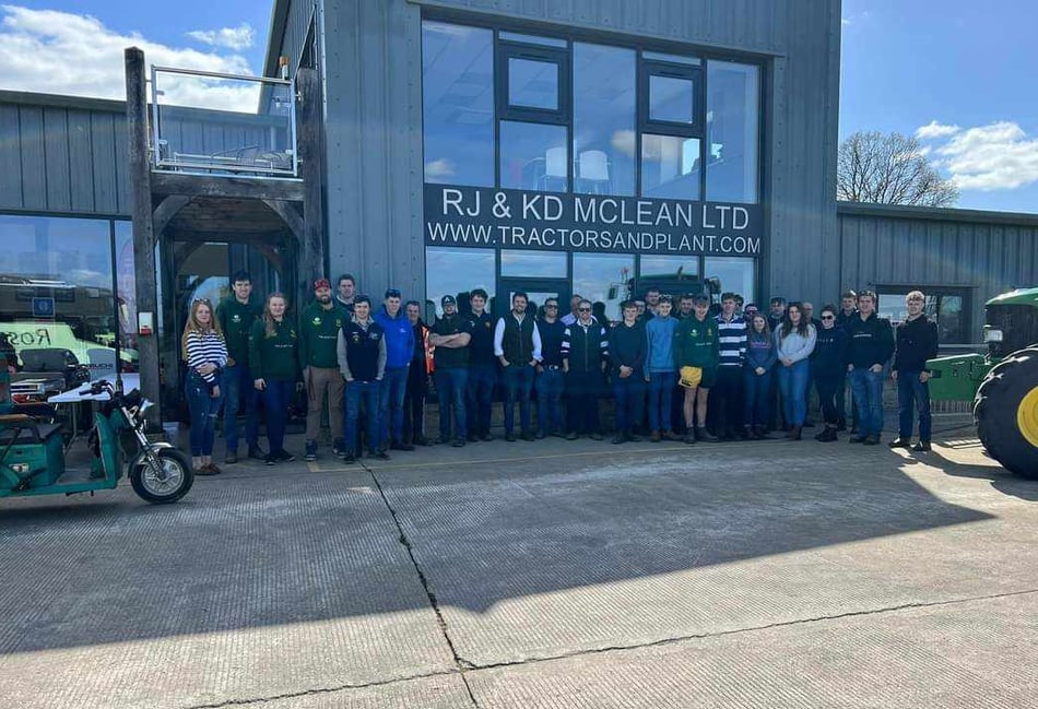 Young Farmers learn about process of agricultural machinery dealing 