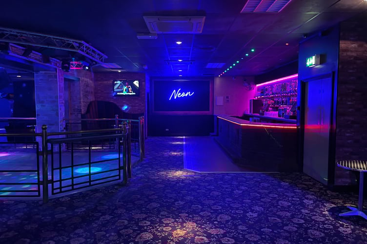Upon entering the nightclub, revellers immediately are greeted with a colourful new identity - with the UV lights and a new carpet to follow (Picture: Aaron Greenaway)