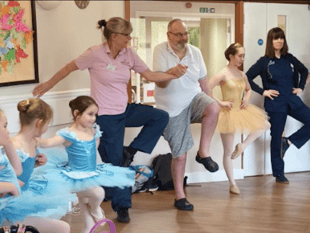 Care home enjoy toe tapping visit and singalong performance