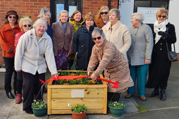 Members of Halwill WI donated a trough to the village with an inscribed plaque to mark their 100th year