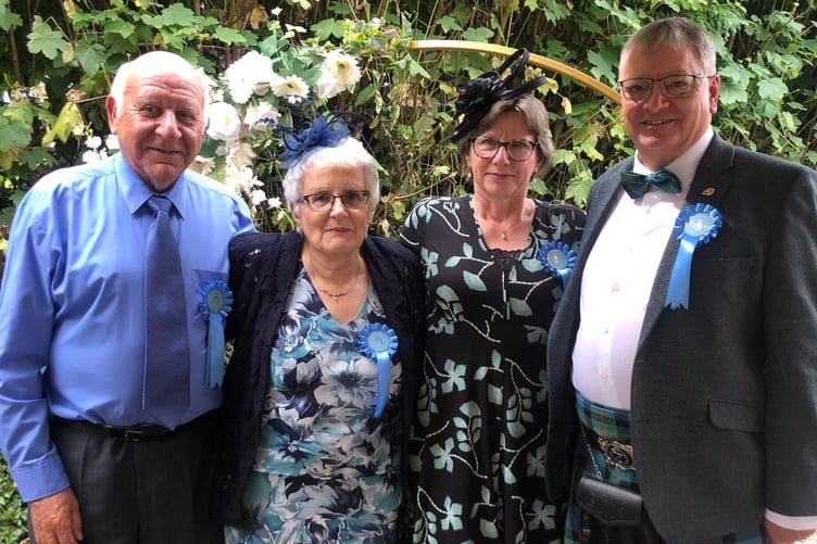 Rosettes were presented to the best dressed men and women