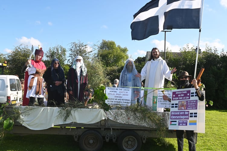 Members of The St Tudy Church with Life of Brian - St Tudy Carnival committee members Penny and Penny celebrating in style - Picture: Adrian Jasper