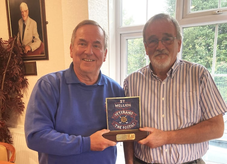 A happy captain of the day, Rob Parsonage, receives the match trophy from Tavistock's Jim McGregor. Picture: St Mellion Golf Club