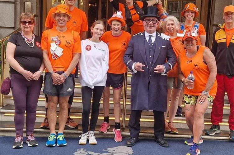 Matt and Sam running every square of the Monopoly board. Picture taken at The Ritz in Mayfair.