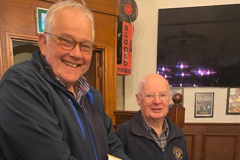 Peter Brown, president of Holsworthy and District Lions celebrating Brian Vanstone on his 30 years of service.