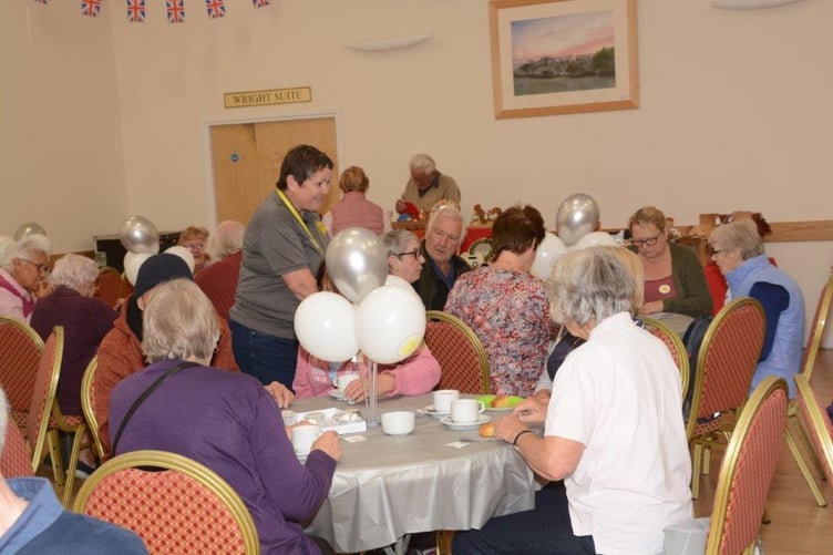 Tea, cake and cheers for Holsworthy Rural Community Transport marking 25 years of serving the community. (Picture: Holsworthy Rural Community Transport)