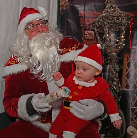 First time meeting Santa is 7 month old Reggie of South Petherwin