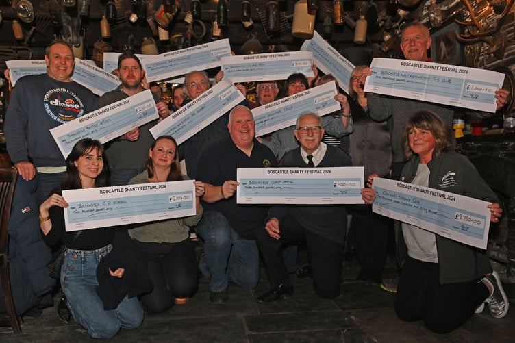 The many representatives from local charities delighted to receive their cheques from the Boscastle Sea Shanty Festival in 2024. (Picture: Adrian Jasper)