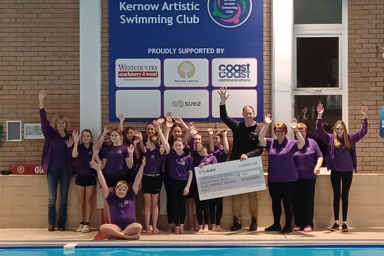 Suez has presented a giant cheque to the Kernow Artistic Swimming Club.