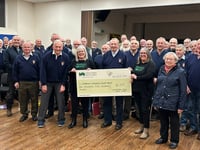 Choir make generous donation to children's hospice